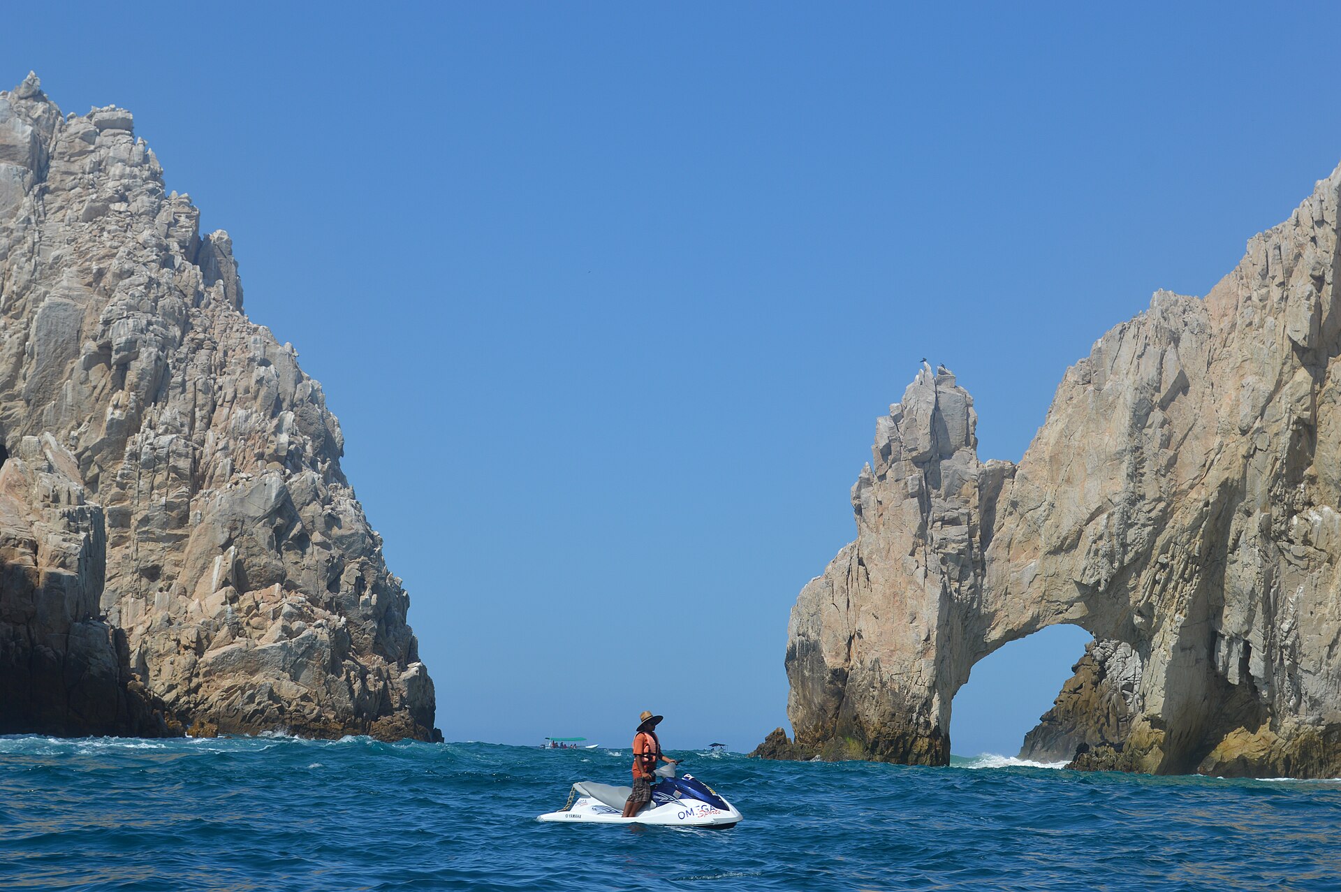 The rock arch El Arco at Land's End, Cabo San Lucas, with deep blue water